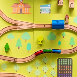 brown and multicolored train toy set